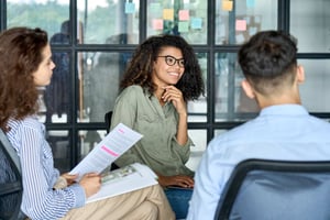 woman brainstorming marketing ideas about project_444921723-min